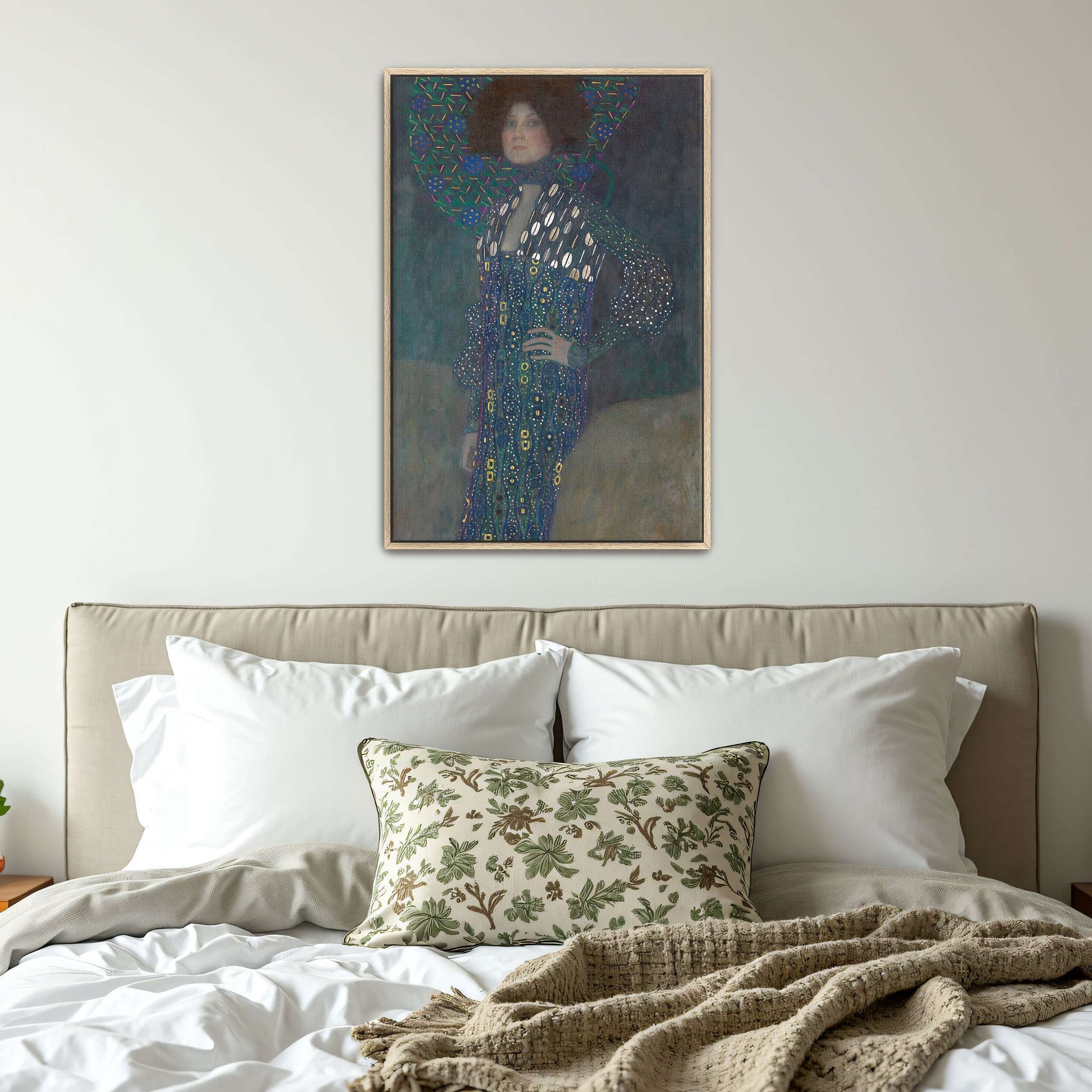 Portrait of a woman in a patterned dress by Gustav Klimt