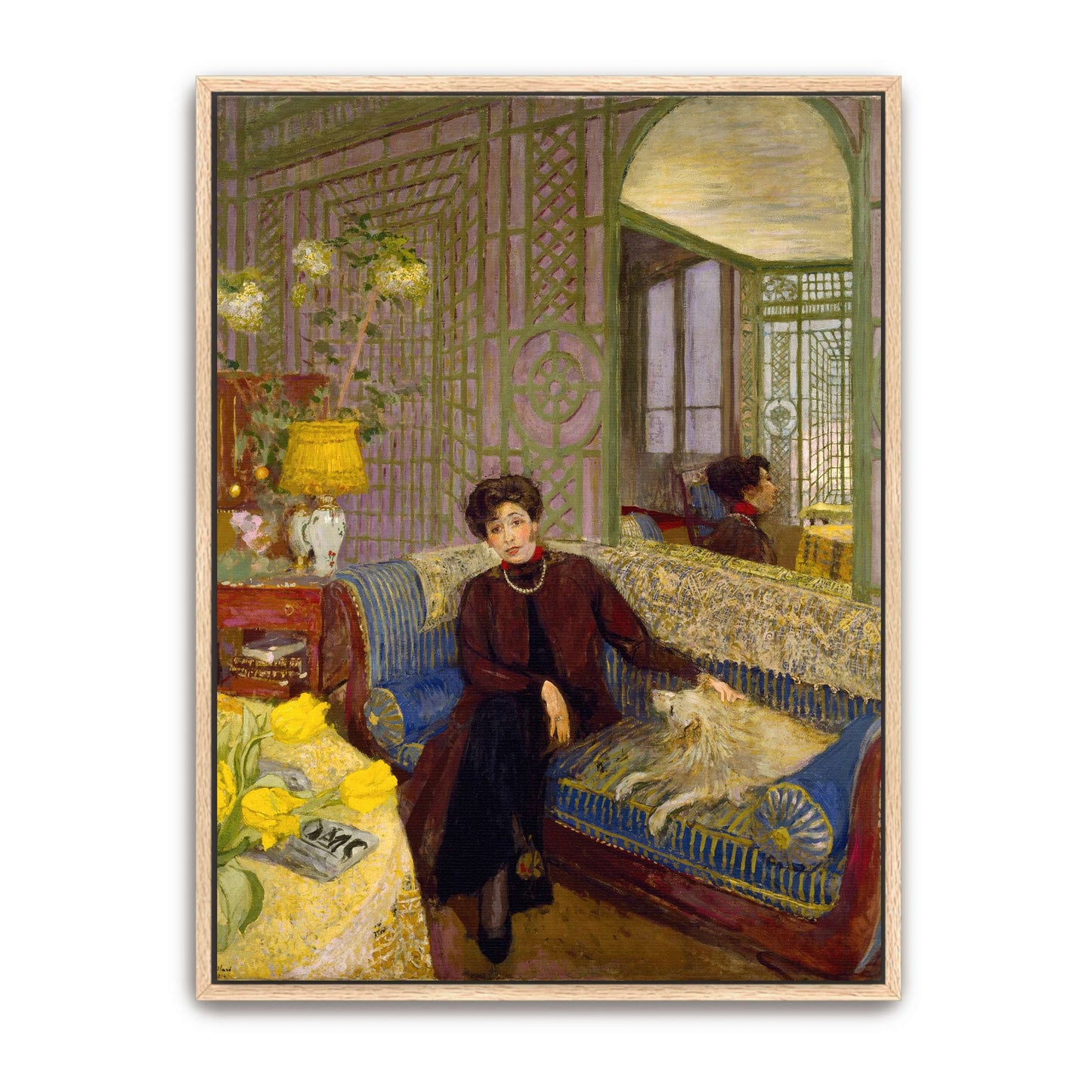 Woman with dog on a blue couch by Édouard Vuillard