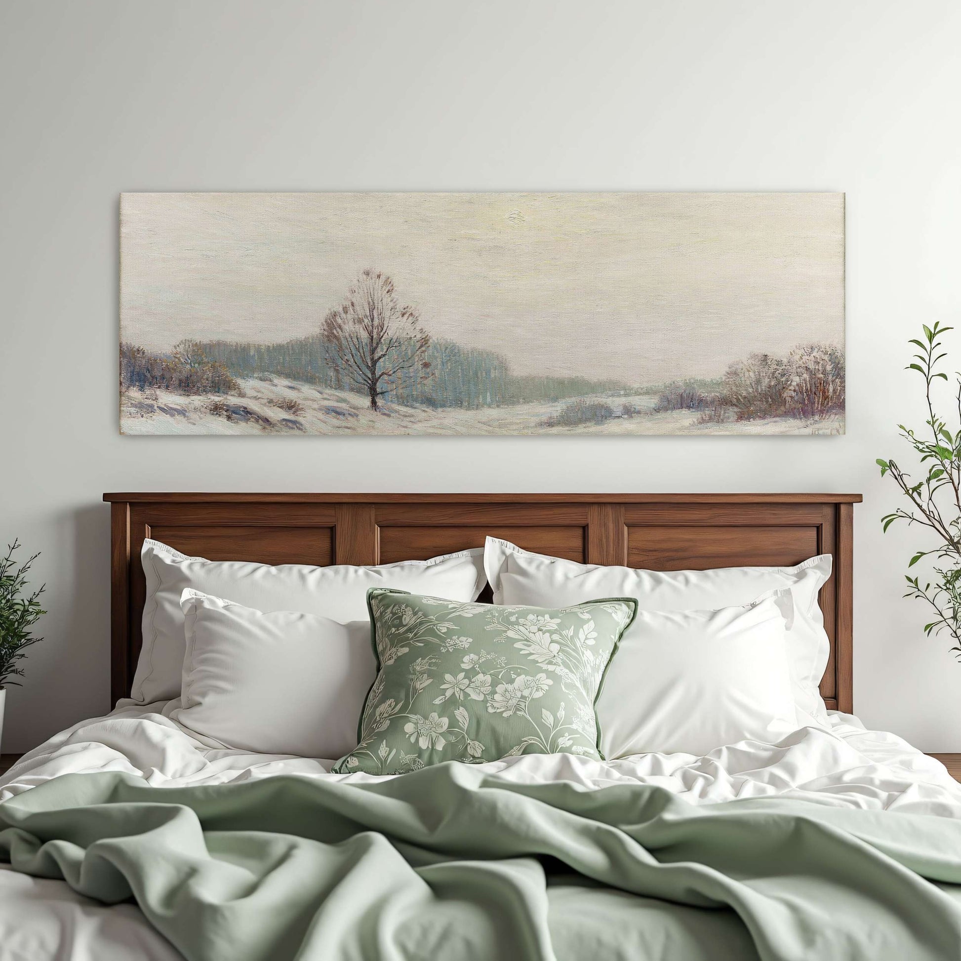 Snowy winter landscape with a lone tree by Leonard Ochtman