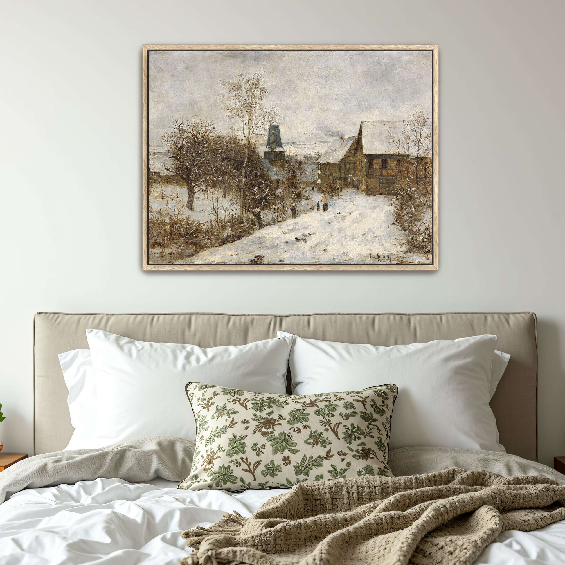 Snowy village scene with houses by Paul Baum