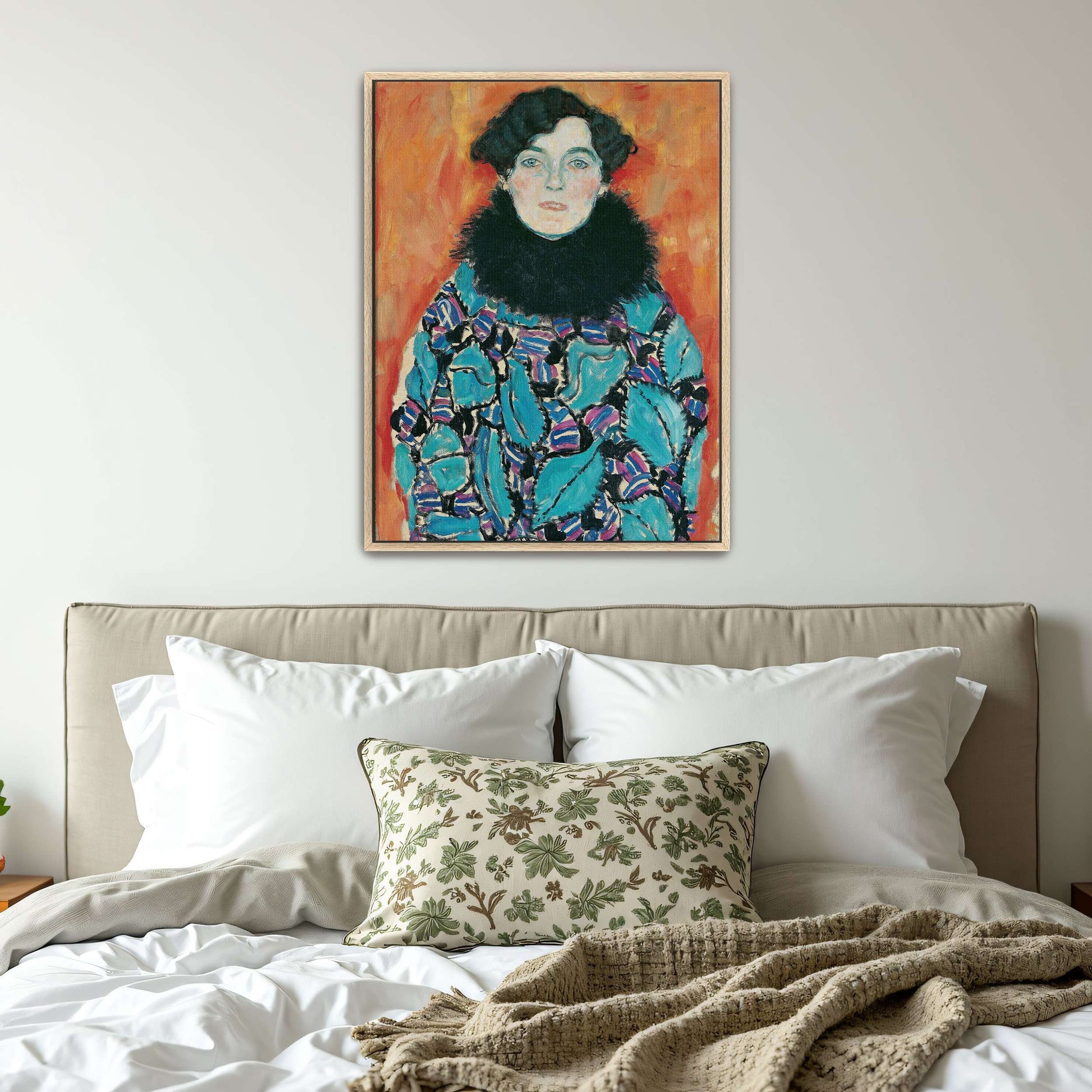 Portrait of a woman in a patterned dress by Gustav Klimt