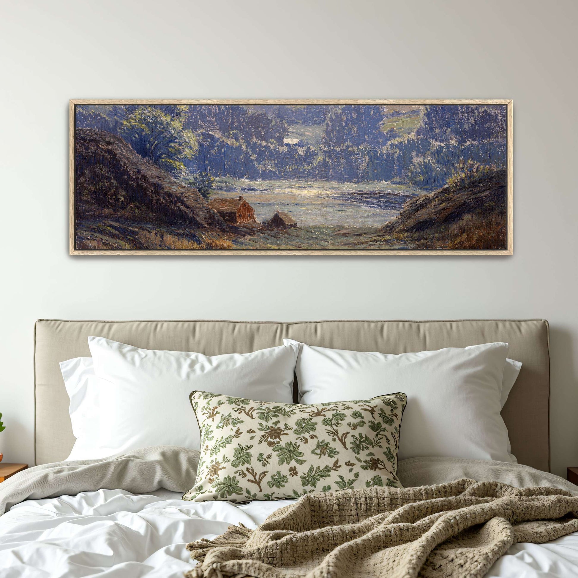 A landscape with a house in a valley by Leonard Ochtman