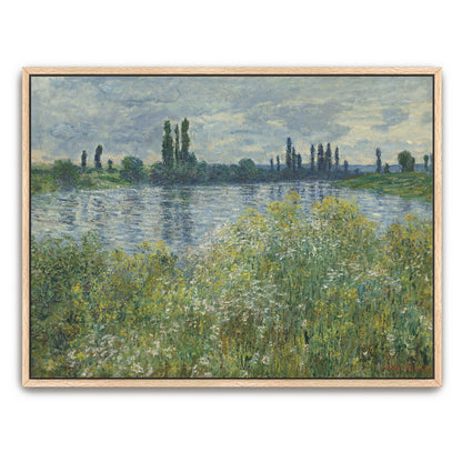 Riverbank With Lush Greenery And Blue Water By Claude Monet