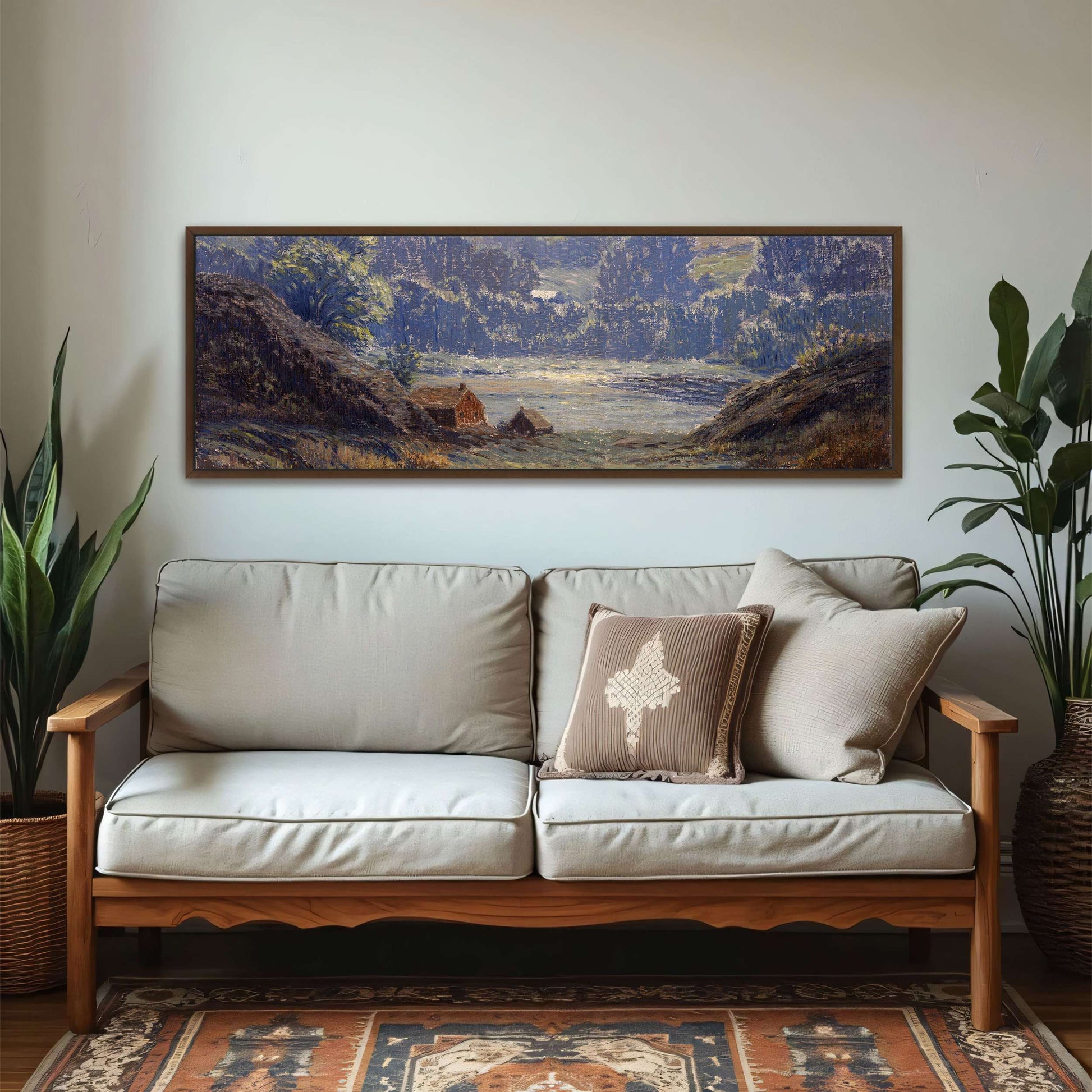 A landscape with a house in a valley by Leonard Ochtman