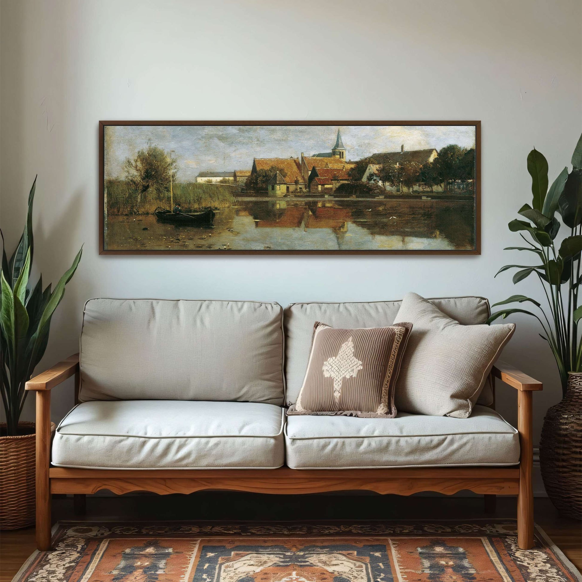 A village by a lake with a boat by Eugen Jettel