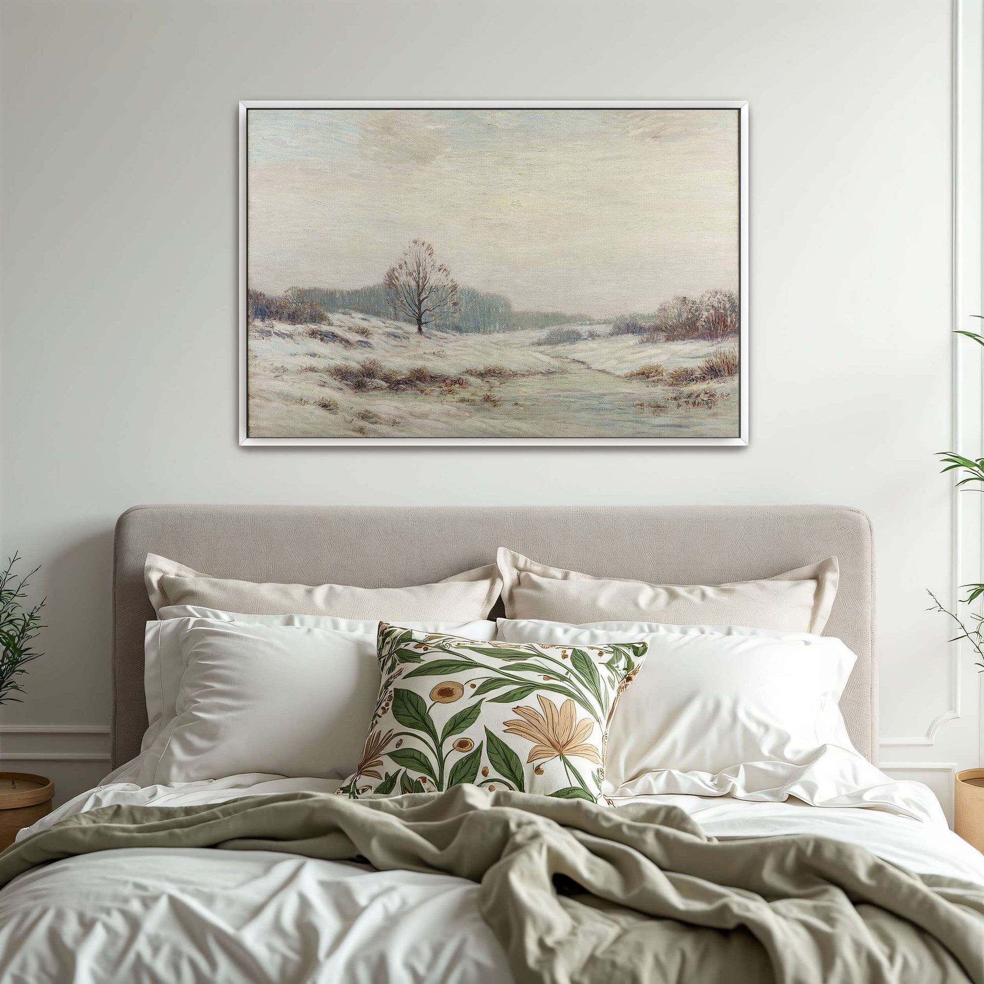 Snowy winter landscape with a lone tree by Leonard Ochtman